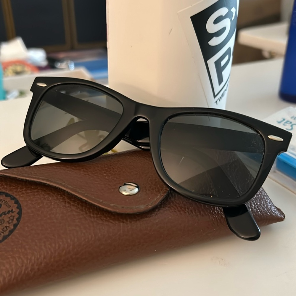 Ray Ban sunglasses from around 2005-2008. Prescription lenses with case.
